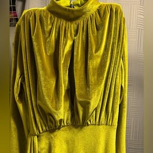 This dress is a long goldish olive green velvet formal evening dress